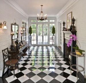 Flooring ideas - Glossy black and white checkerboard floor in hallway.jpg